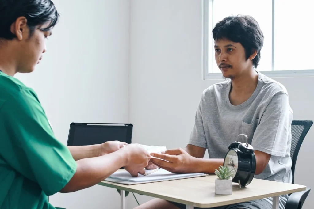 Nurse pictured with patient